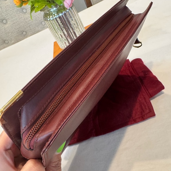 Authentic Cartier clutch bag with authenticity card